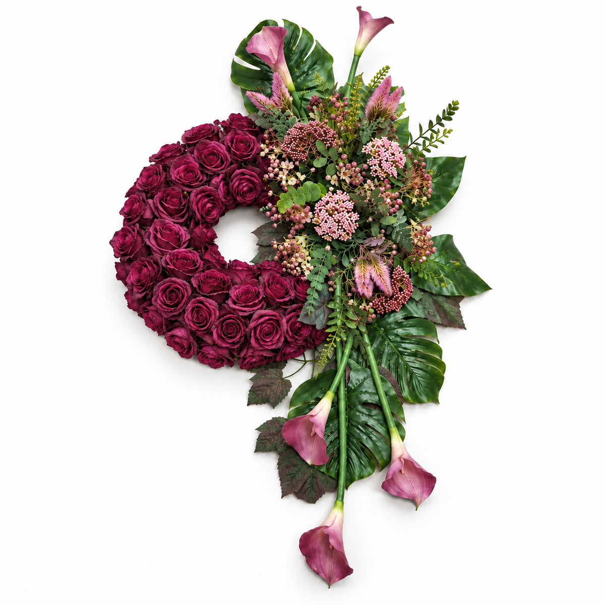 Rouwkrans met pruimkleurige rozen en roze calla’s, bovenaanzicht