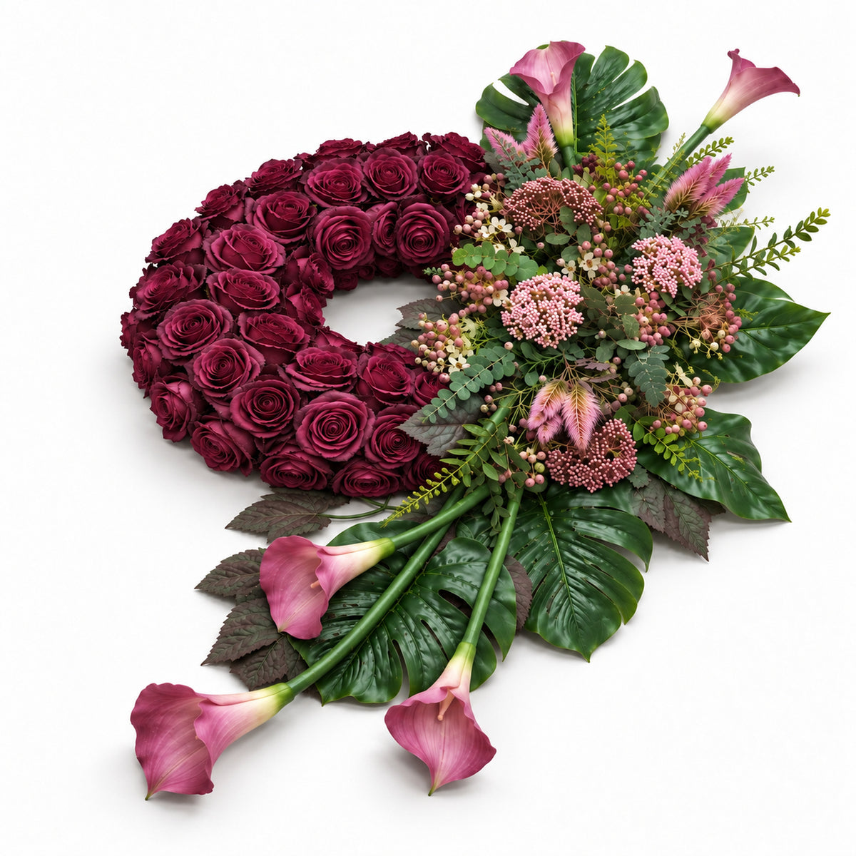 Rouwkrans met rozen en calla’s, schuin aanzicht